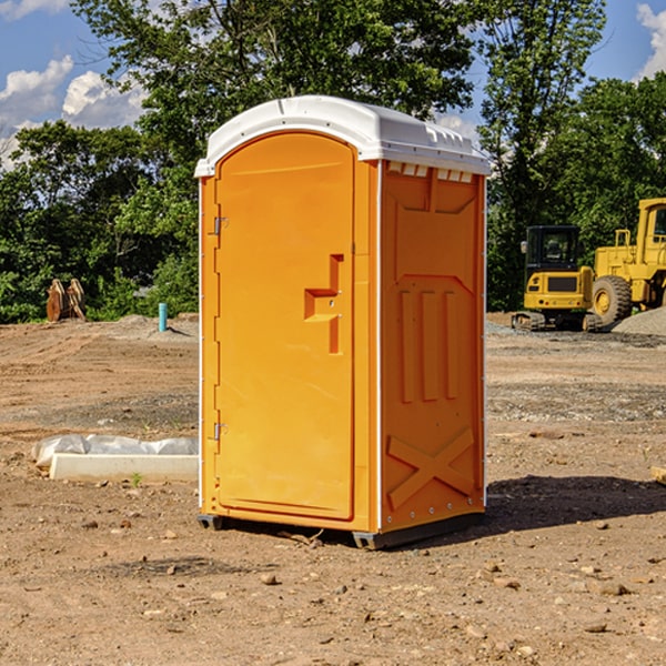 how often are the porta potties cleaned and serviced during a rental period in Red Cedar